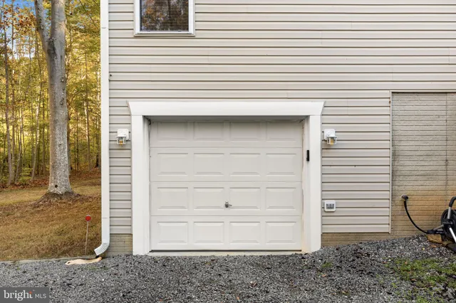 a view of a balcony with wooden floor and lake view