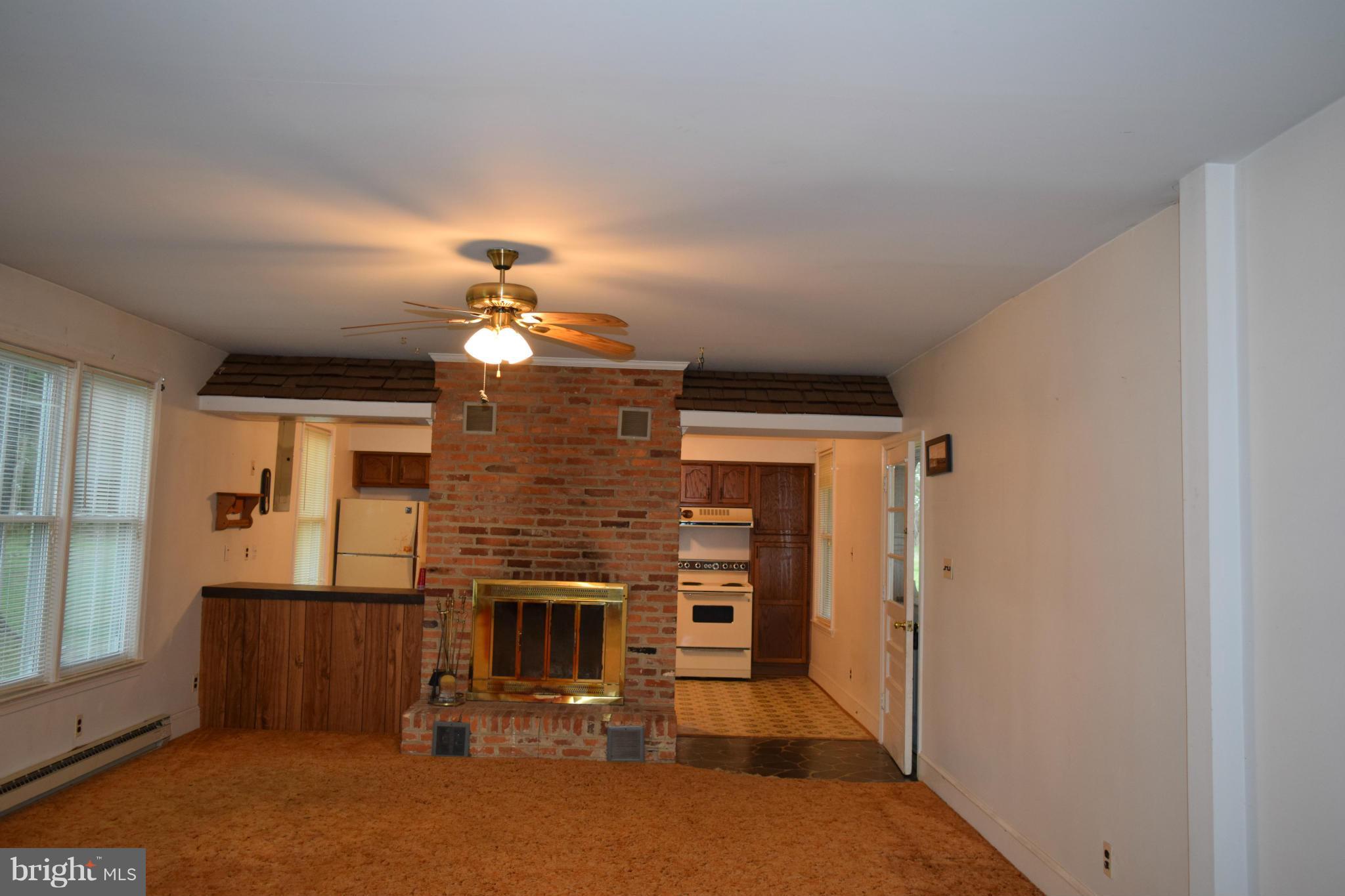 110 Persistence Lane Castleton, VA 22716 - Photo 14 of 24 a view of a livingroom with a fireplace