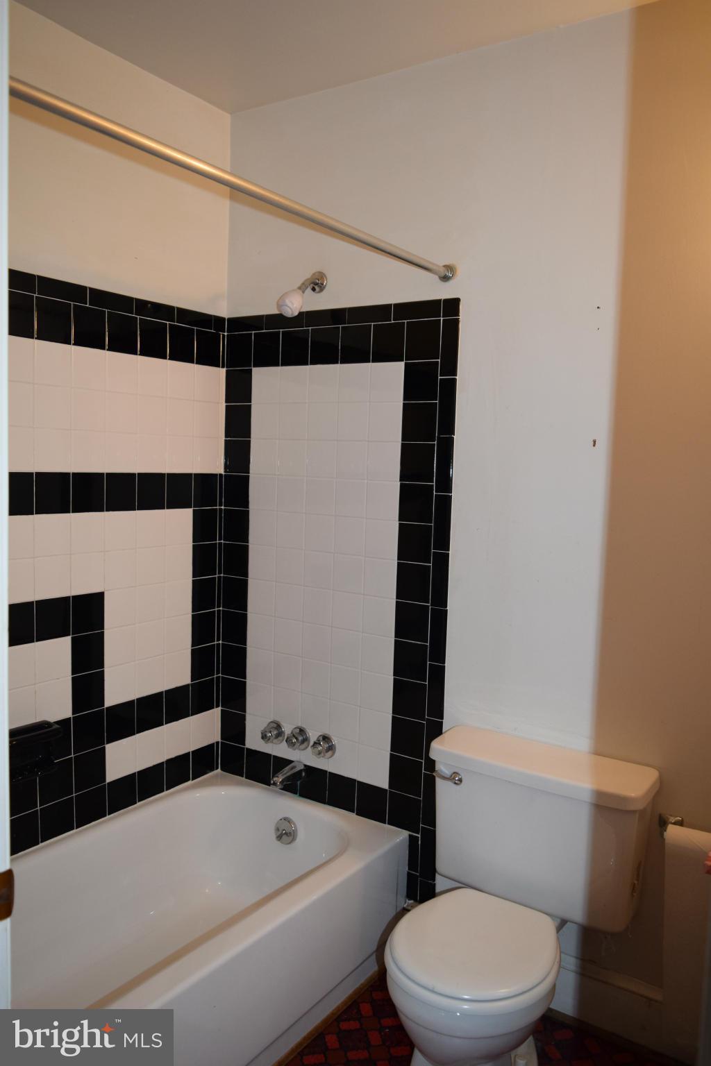 110 Persistence Lane Castleton, VA 22716 - Photo 16 of 24 a bathroom with a toilet and a shower
