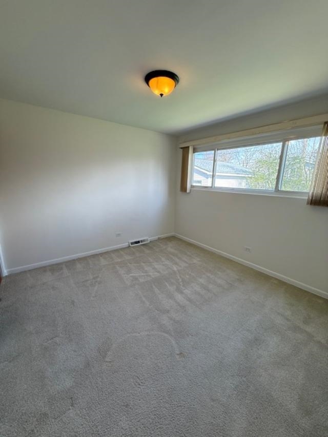 939 South Grace Street Lombard, IL 60148 - Photo 15 of 26 an empty room with a window