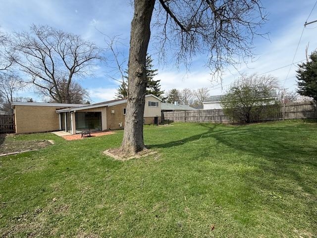 939 South Grace Street Lombard, IL 60148 - Photo 25 of 26 a front view of house with yard and tree