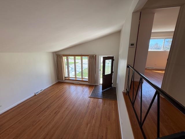 939 South Grace Street Lombard, IL 60148 - Photo 4 of 26 a view of a room with wooden floor and staircase