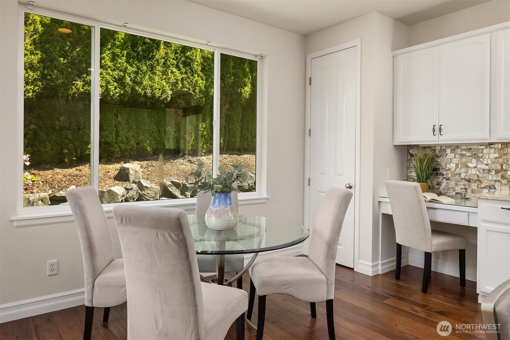 16148 Parkside Way Southeast Renton, WA 98058 - Photo 21 of 40 a view of a dining room with furniture window and outside view