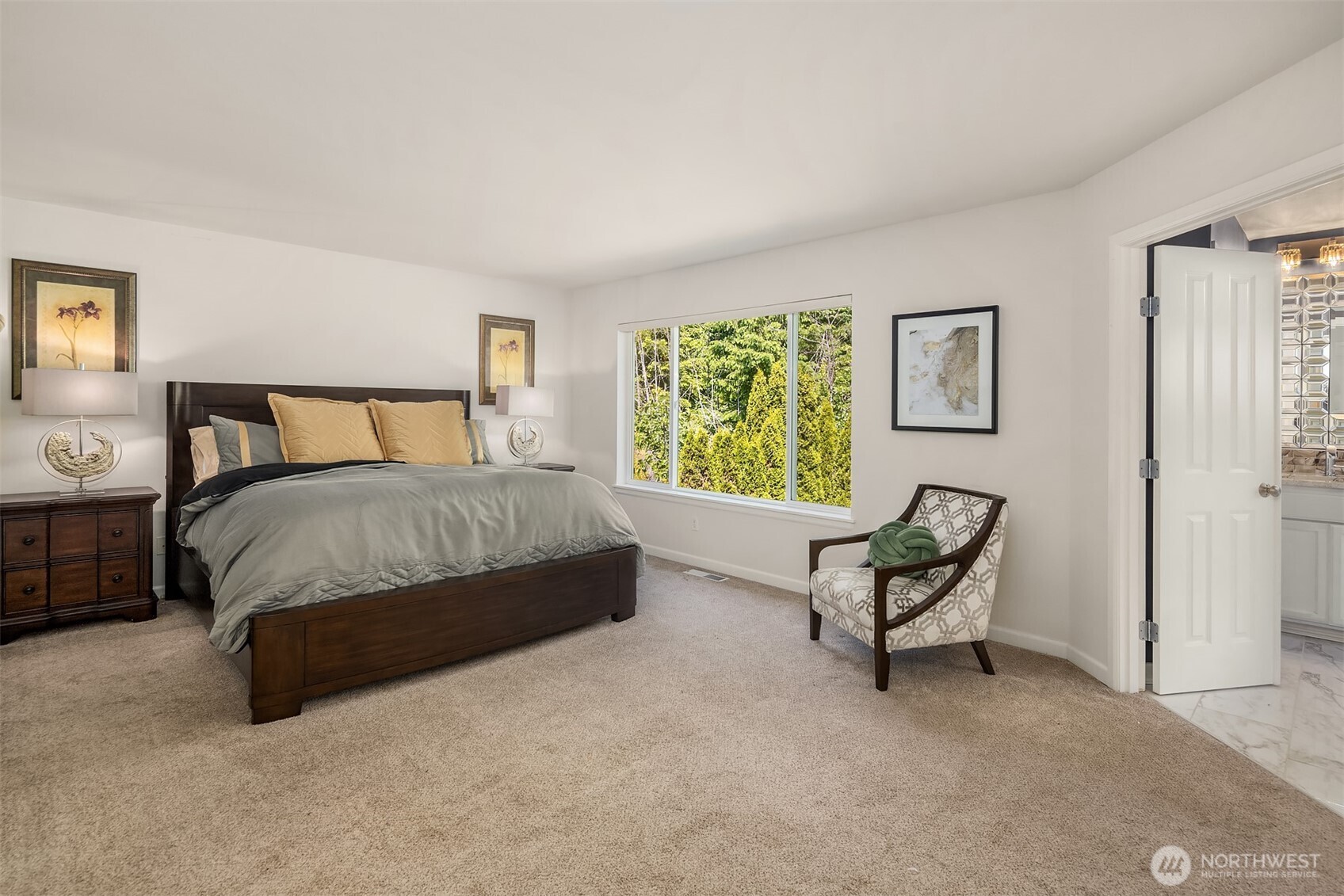 16148 Parkside Way Southeast Renton, WA 98058 - Photo 27 of 40 a bedroom with a bed a chair and a window