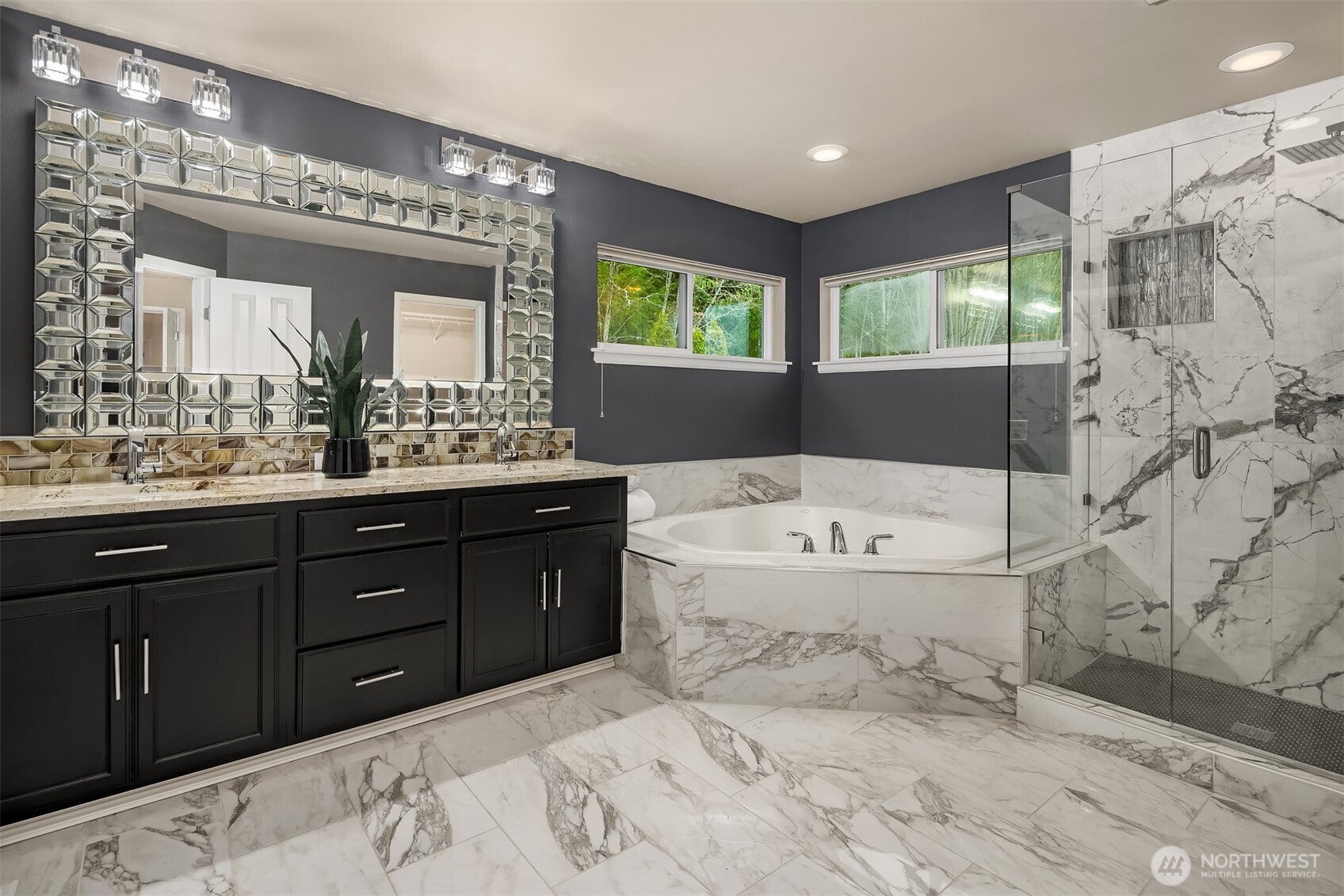 16148 Parkside Way Southeast Renton, WA 98058 - Photo 29 of 40 a bathroom with a tub sink and mirror