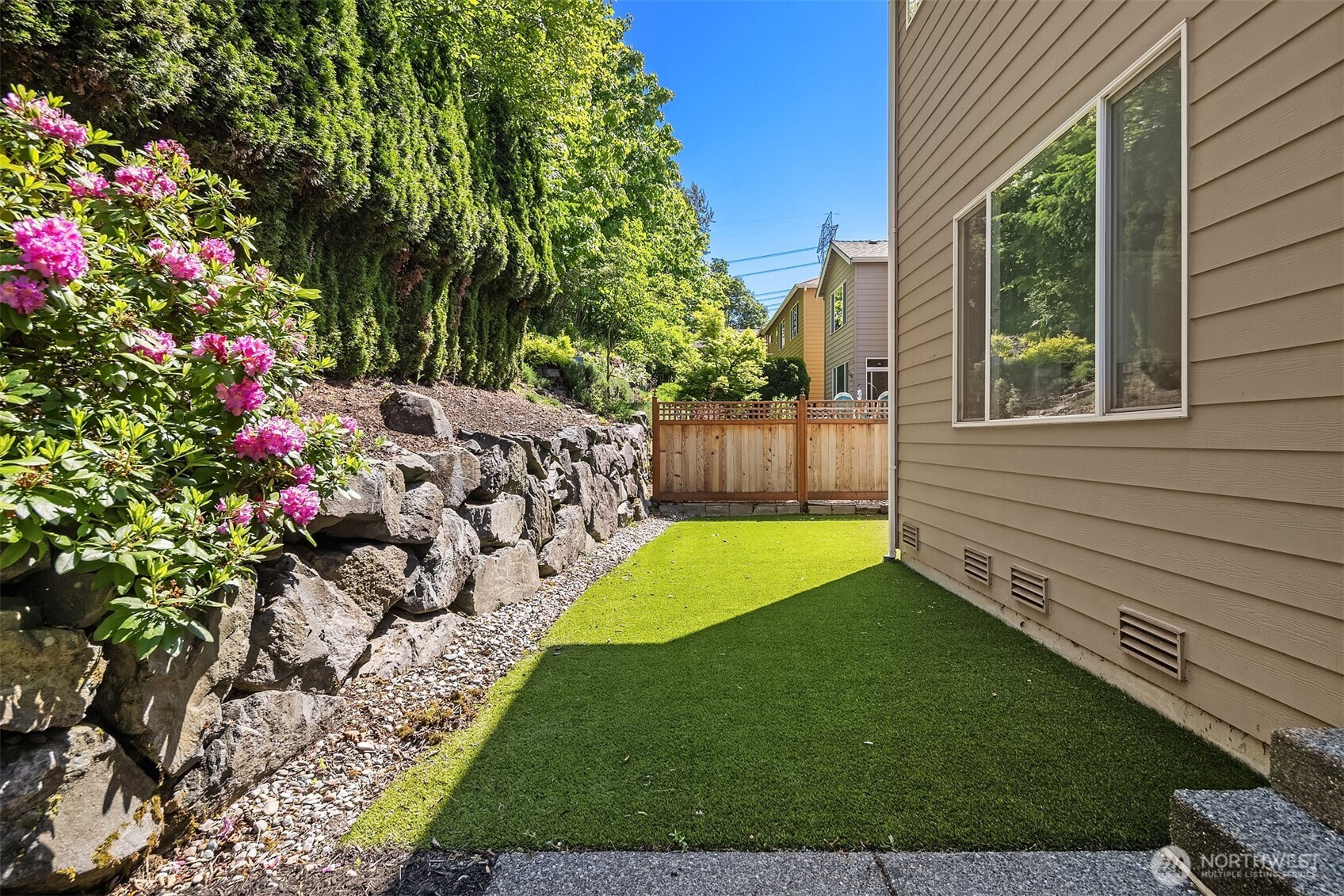 16148 Parkside Way Southeast Renton, WA 98058 - Photo 36 of 40 a view of a backyard with a garden