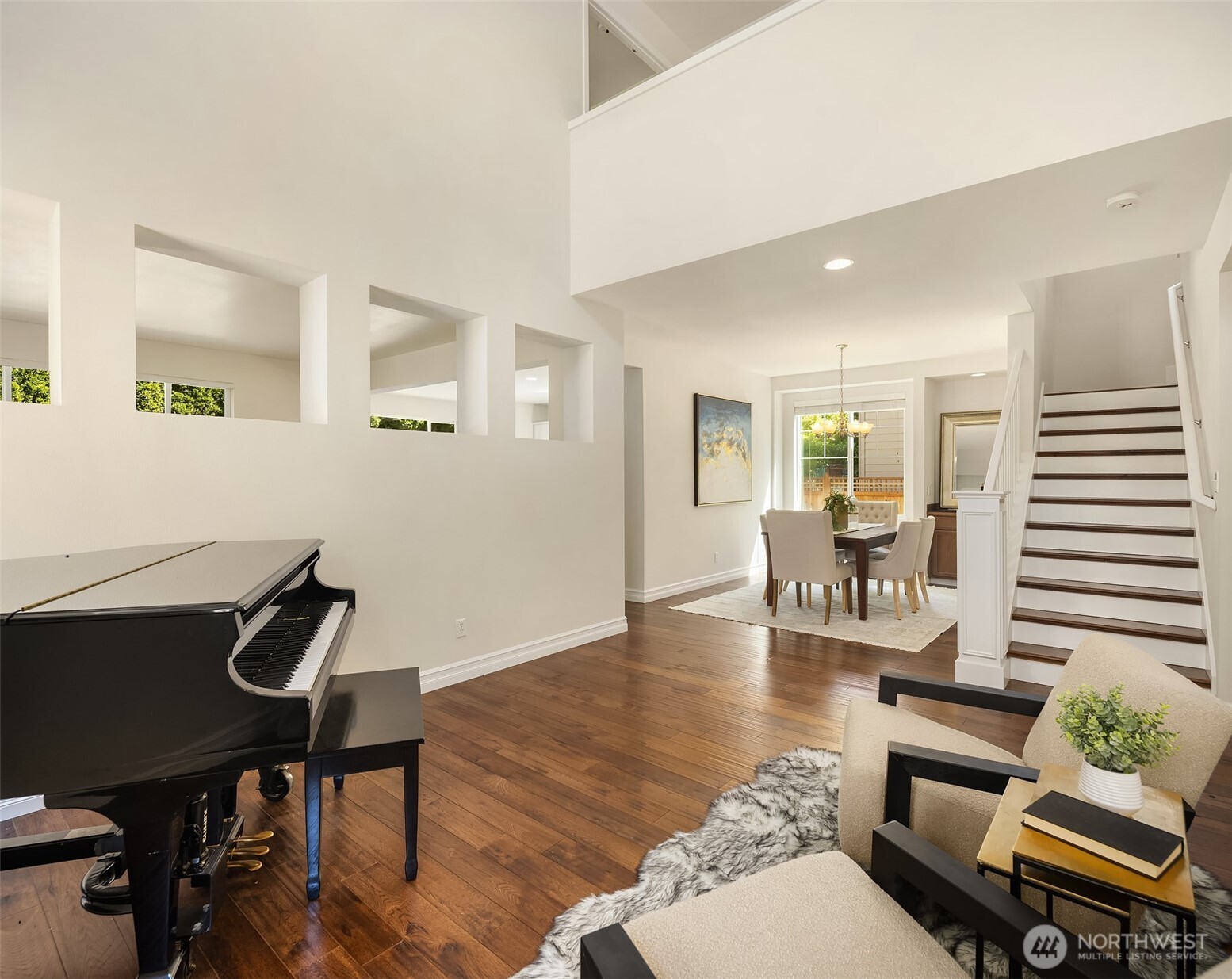 16148 Parkside Way Southeast Renton, WA 98058 - Photo 8 of 40 a living room with furniture and wooden floor