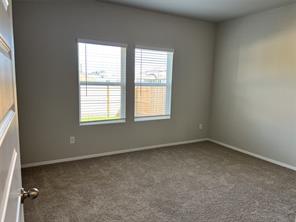 13309 Riding Drive Manor, TX 78653 - Photo 13 of 34 Primary bedroom