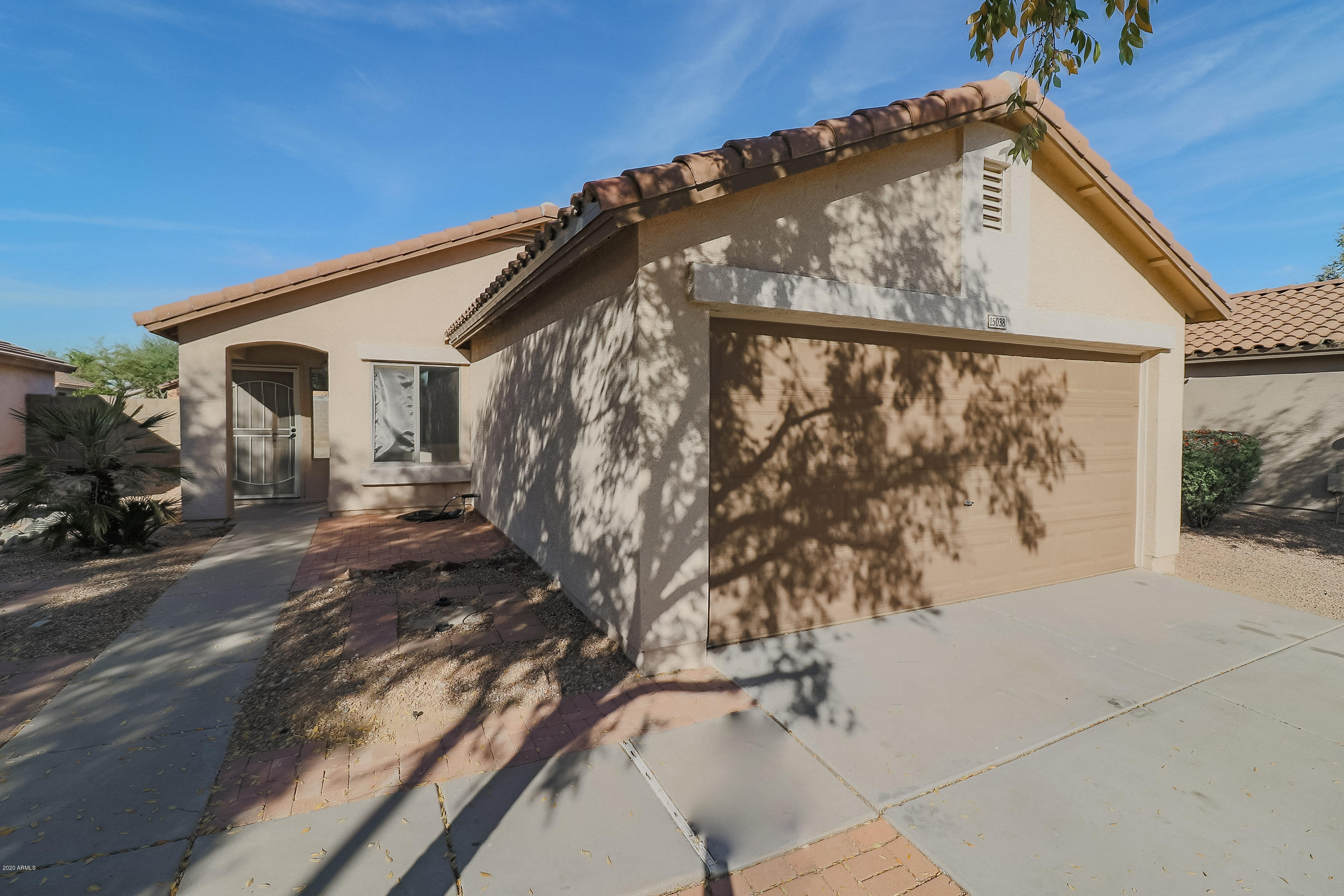 15038 West Redfield Road Surprise, AZ 85379 - Photo 3 of 21 a view of a house with a street