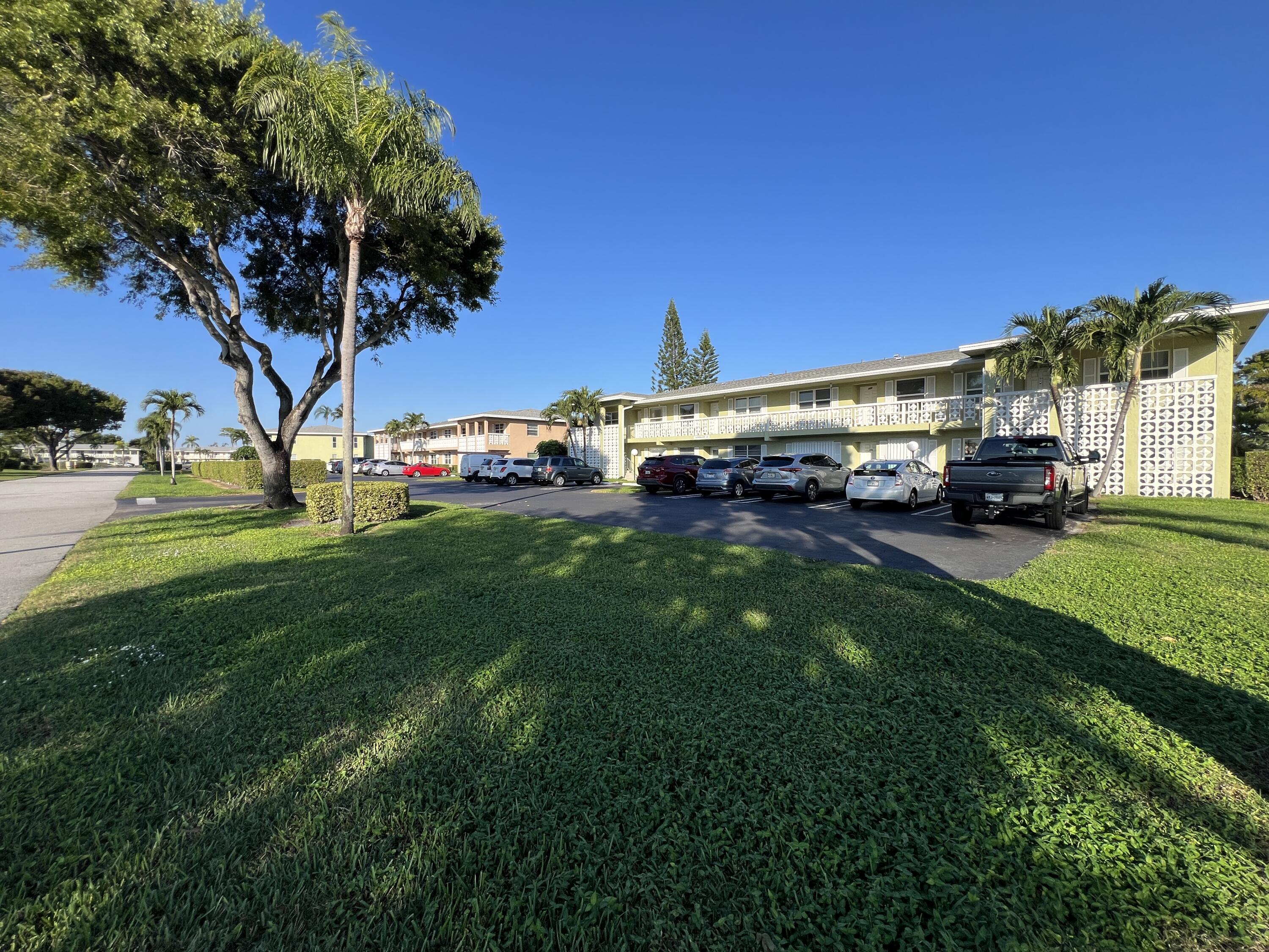 a view of a house with a big yard