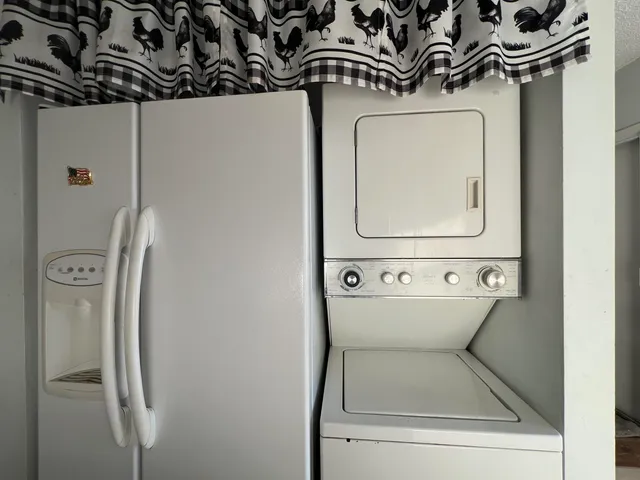 a bed room with furniture and mirror