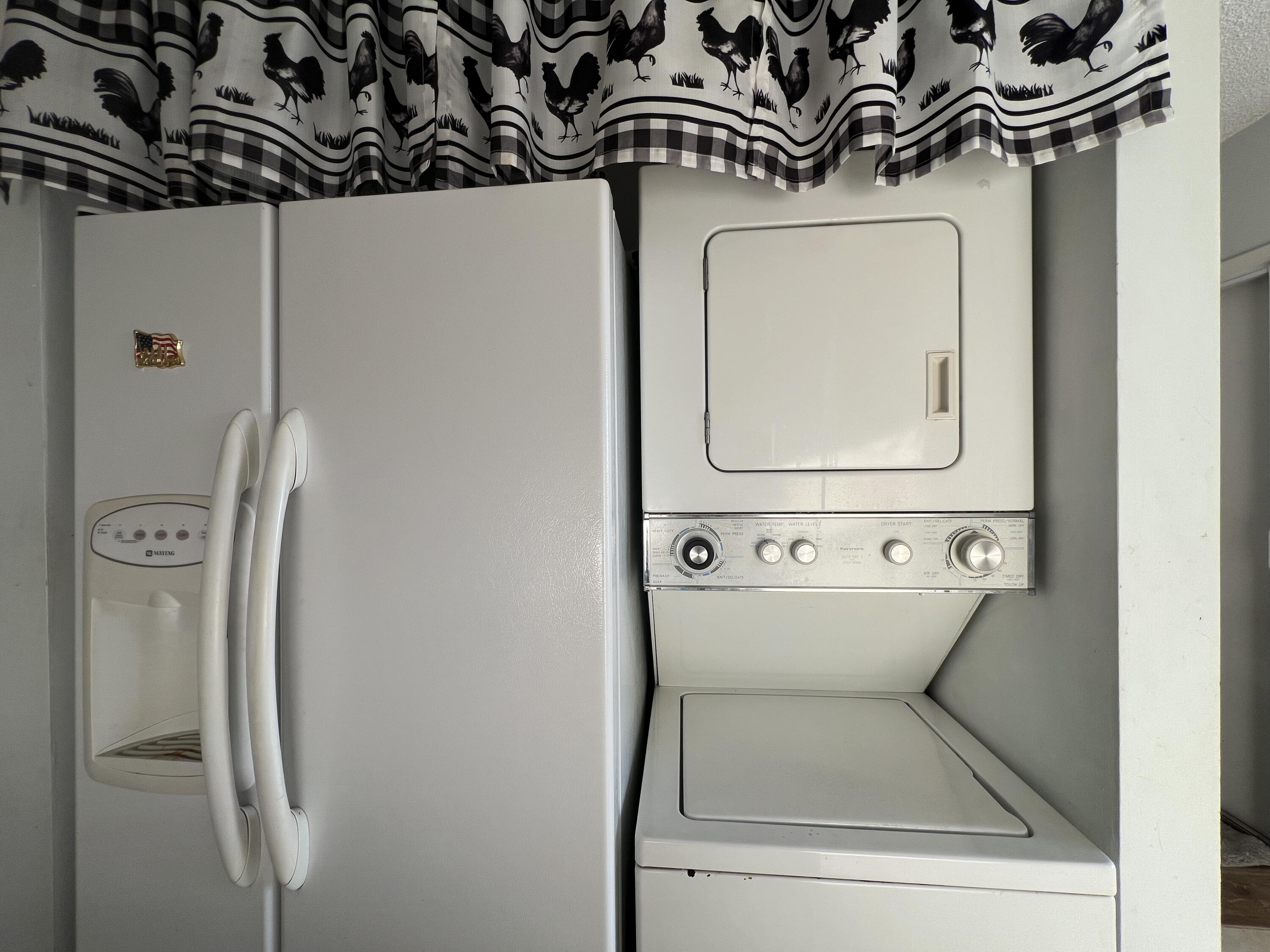 1150 Boxwood Drive, Unit 202 Delray Beach, FL 33445 - Photo 12 of 19 a bathroom with a toilet and a mirror