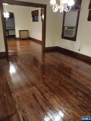 a view of a livingroom with wooden floor