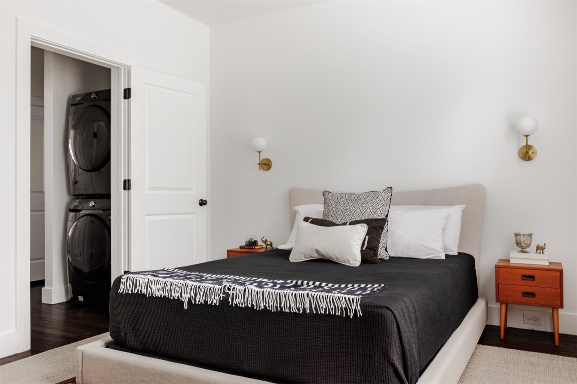 4007 Avenue F Austin, TX 78751 - Photo 17 of 35 a bedroom with a bed and wooden floor