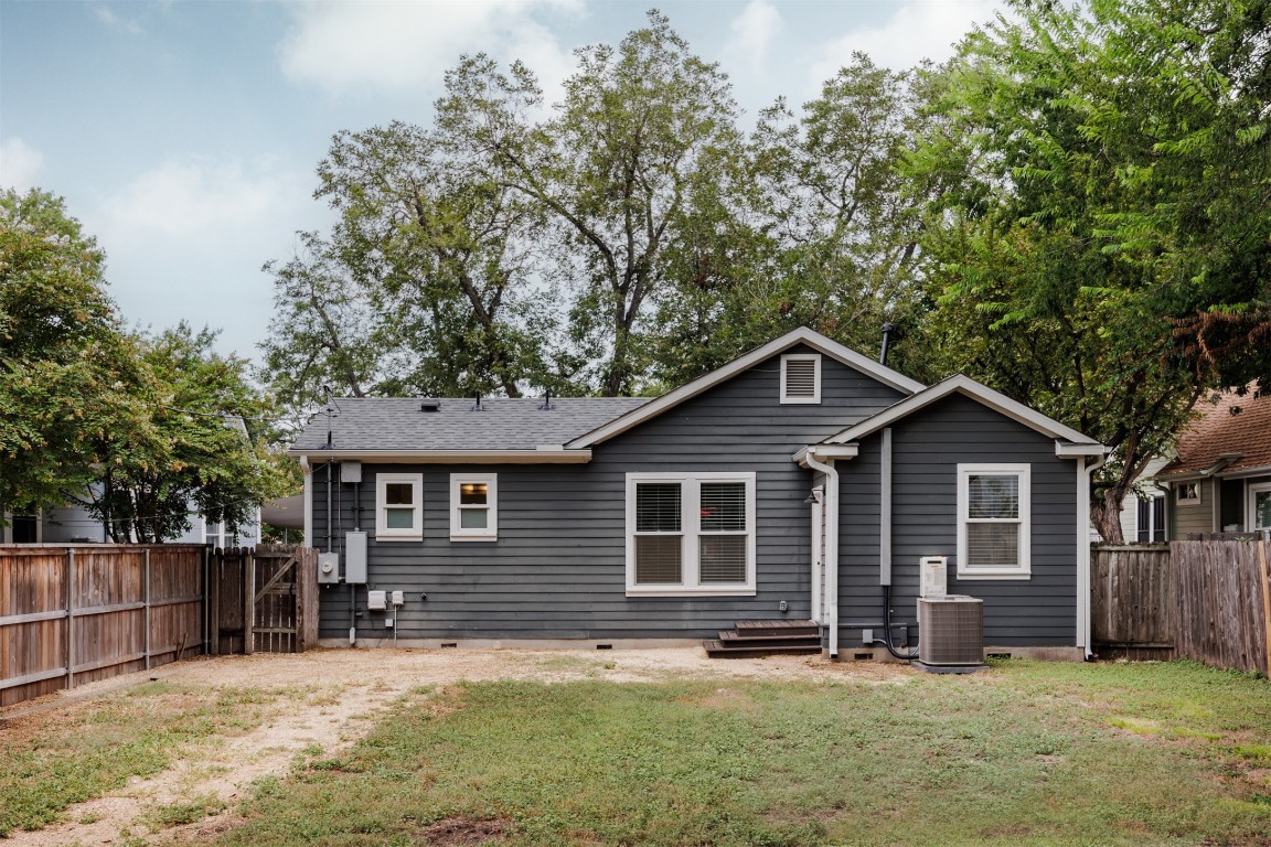 4007 Avenue F Austin, TX 78751 - Photo 31 of 35 a front view of a house with yard and trees in the background
