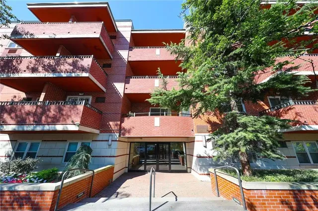a view of a cafe with sitting area
