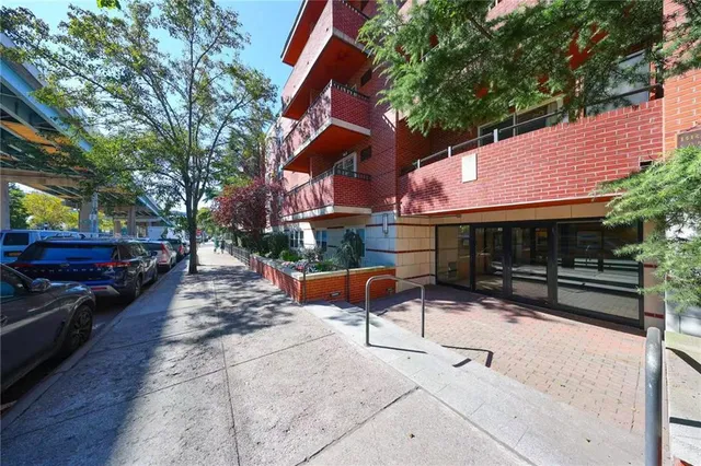 a view of a patio with table and chairs and potted plants