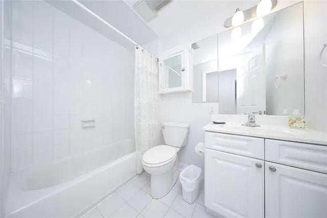 a bathroom with a sink a toilet and a bathtub