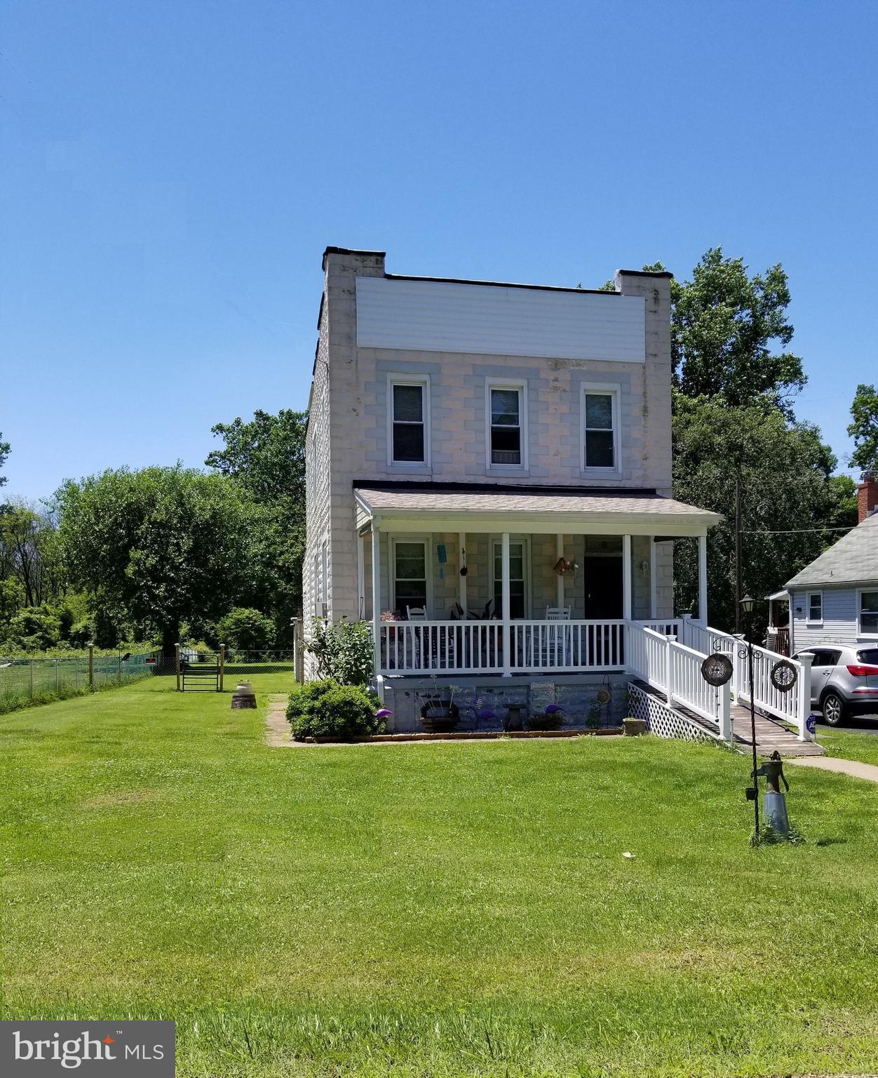 1115 Rosedale Avenue Baltimore, MD 21237 - Photo 2 of 27 a front view of house with yard and green space