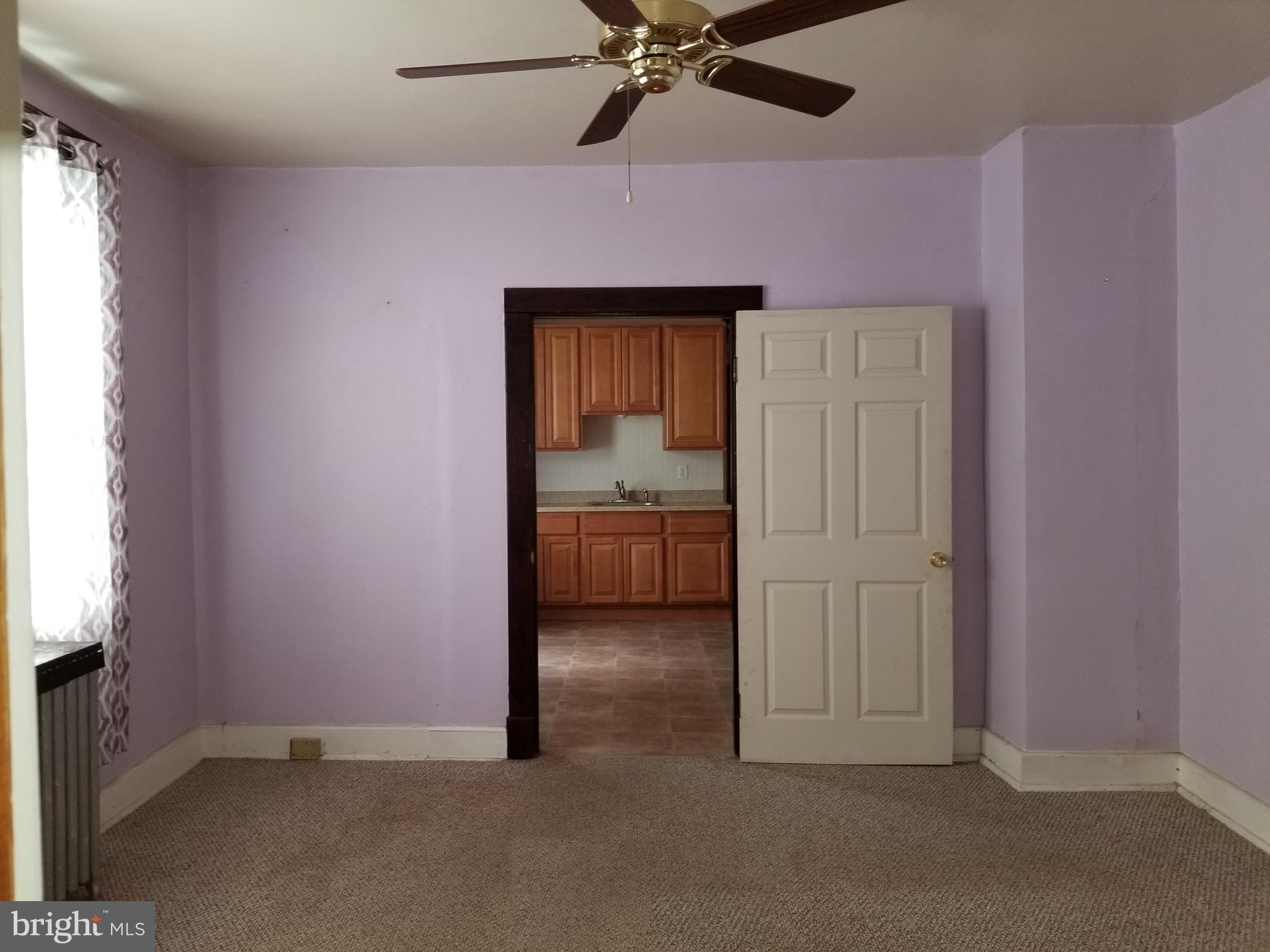 1115 Rosedale Avenue Baltimore, MD 21237 - Photo 12 of 27 a view of a livingroom and a gallery