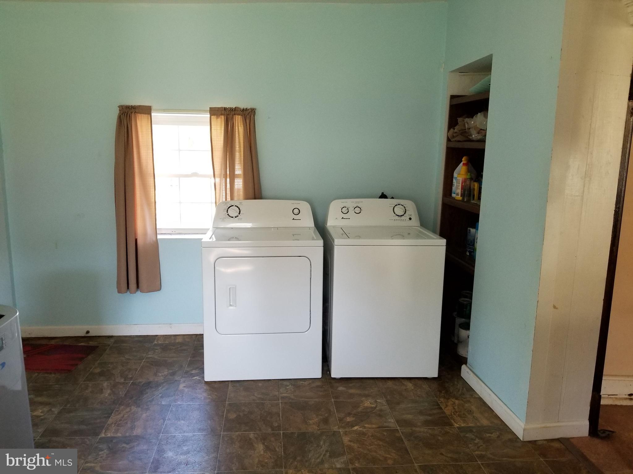 1115 Rosedale Avenue Baltimore, MD 21237 - Photo 22 of 27 a utility room with dryer and washer