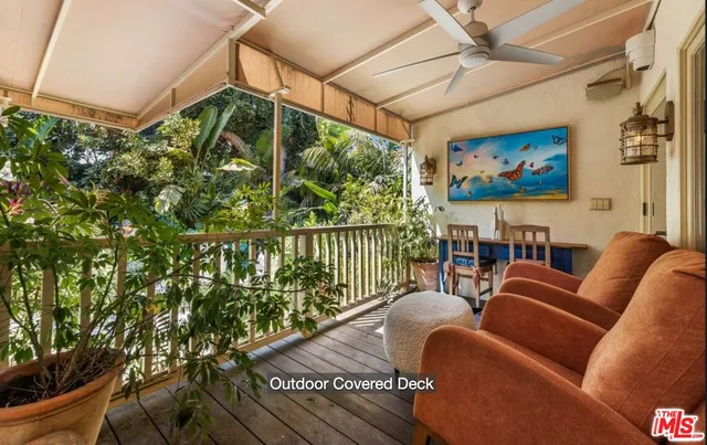 a balcony with furniture