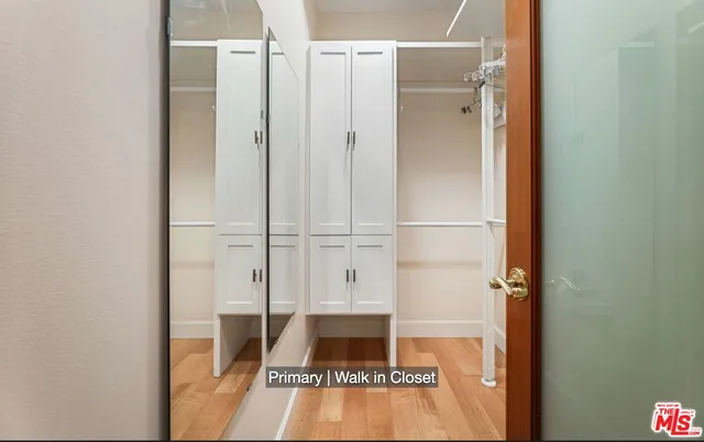 a bathroom with a tub and shower