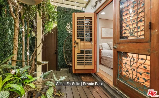 a view of a door and a window