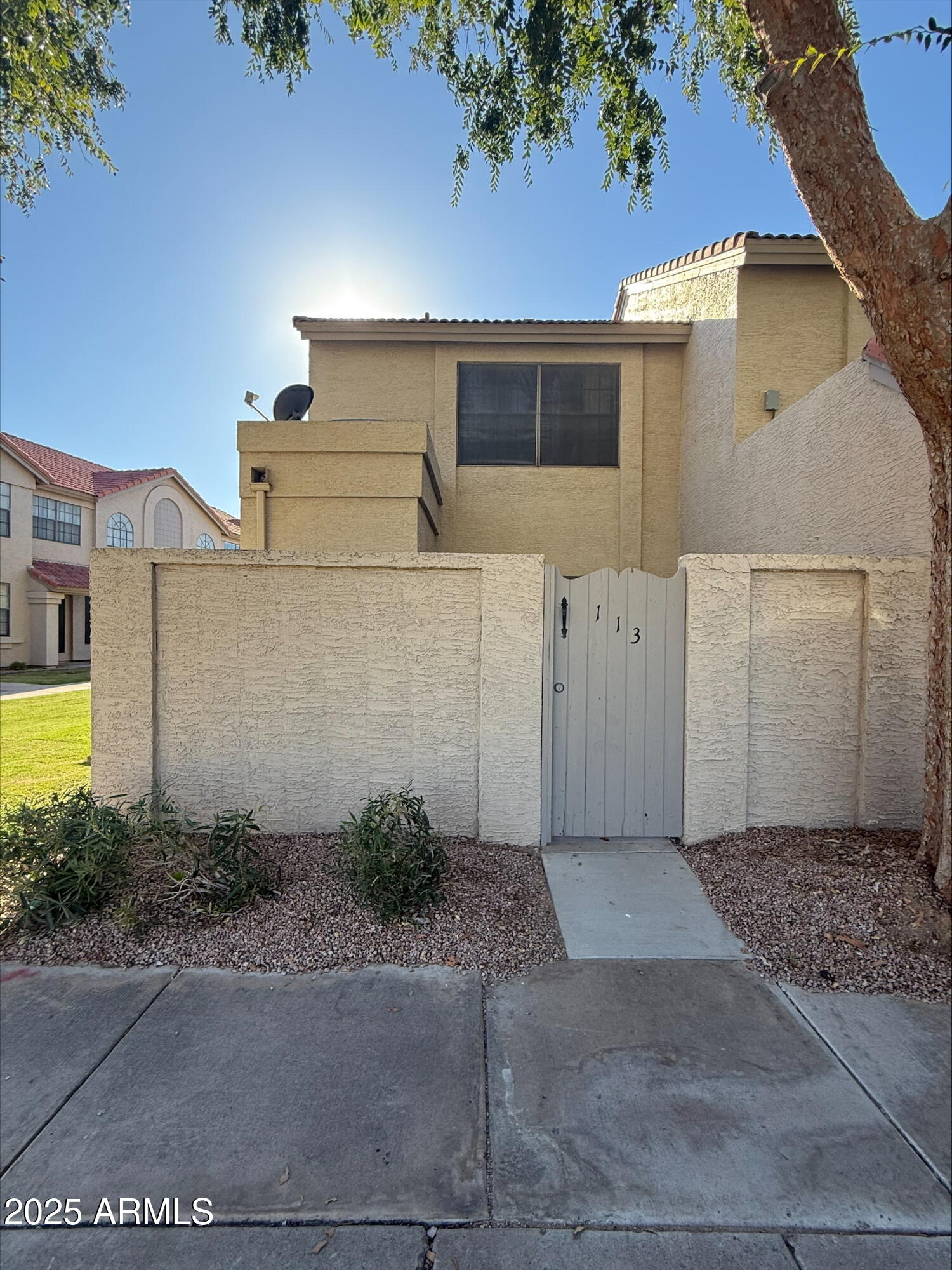 3930 West Monterey Street, Unit 113 Chandler, AZ 85226 - Photo 20 of 20 a view of a house with a yard