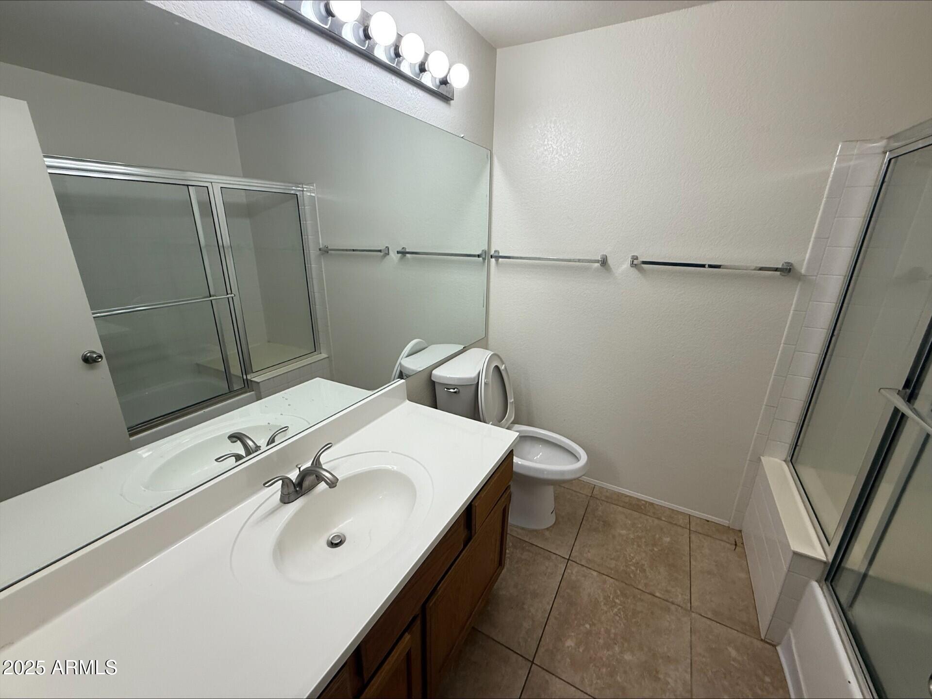 3930 West Monterey Street, Unit 113 Chandler, AZ 85226 - Photo 7 of 20 a bathroom with a sink and mirror