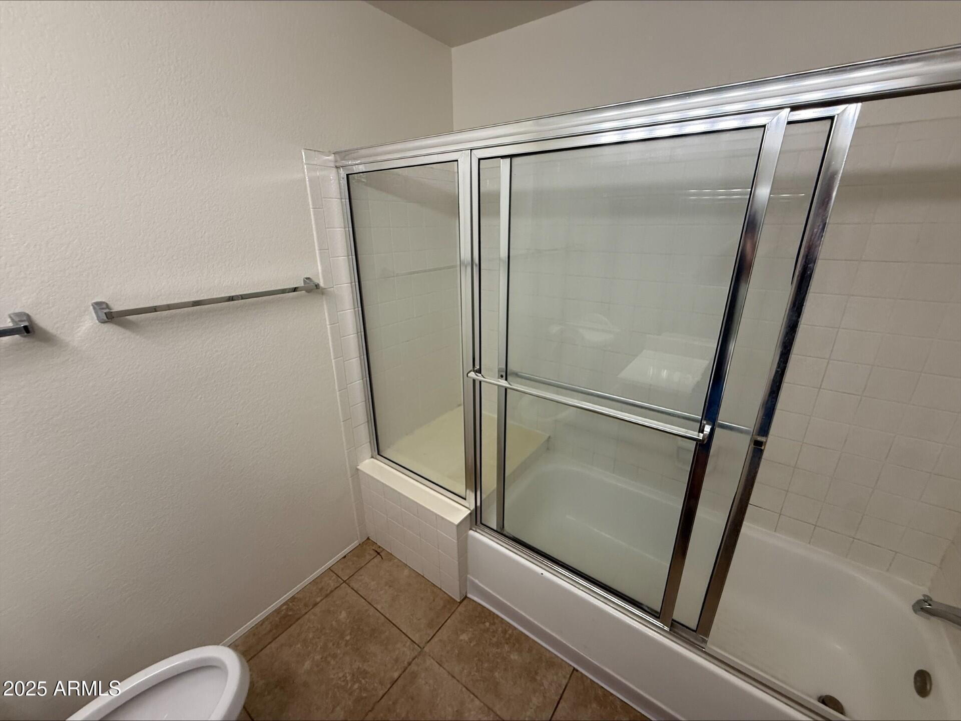 3930 West Monterey Street, Unit 113 Chandler, AZ 85226 - Photo 10 of 20 a bathroom with a glass shower door