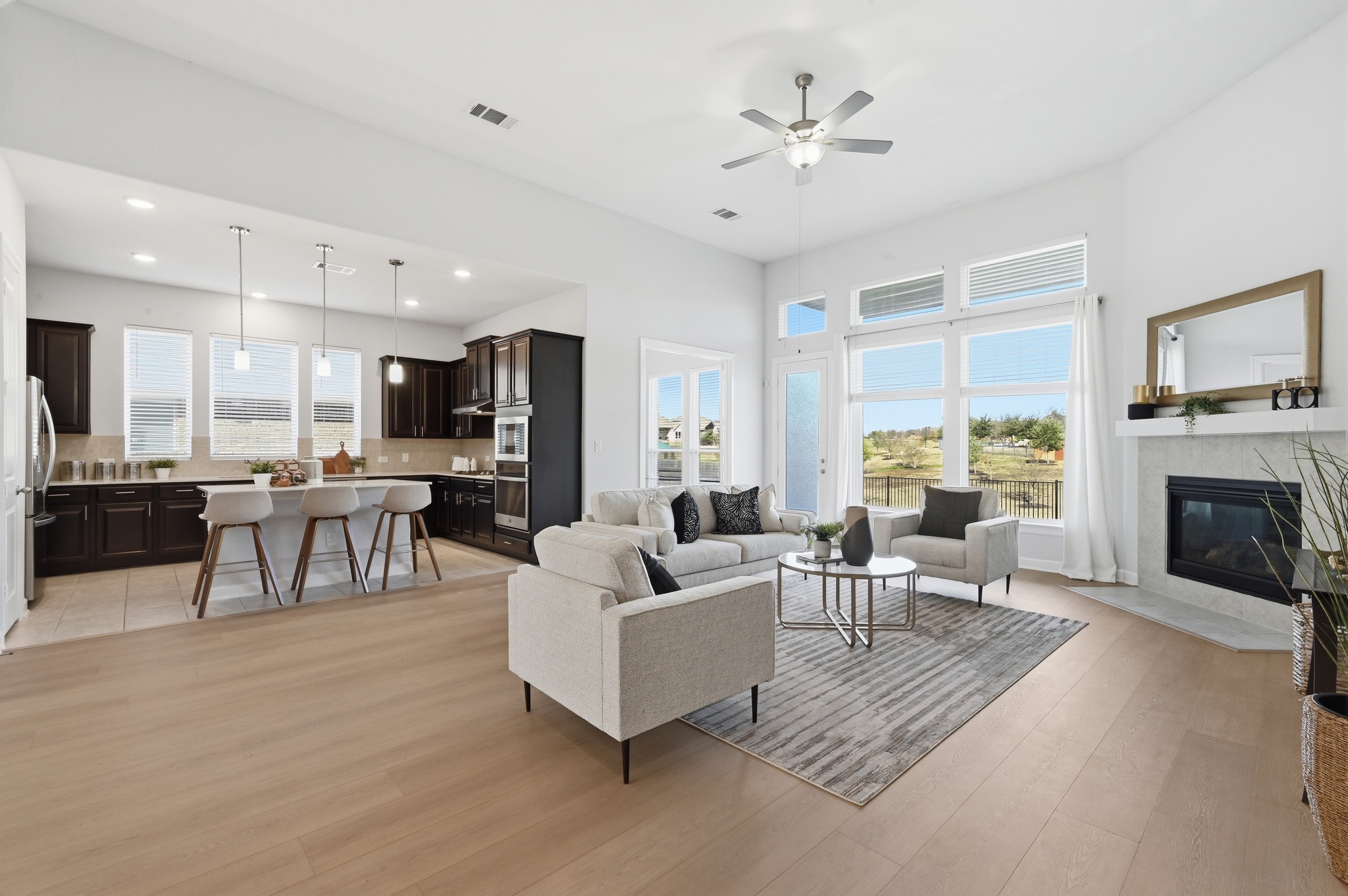a living room with furniture and a fireplace