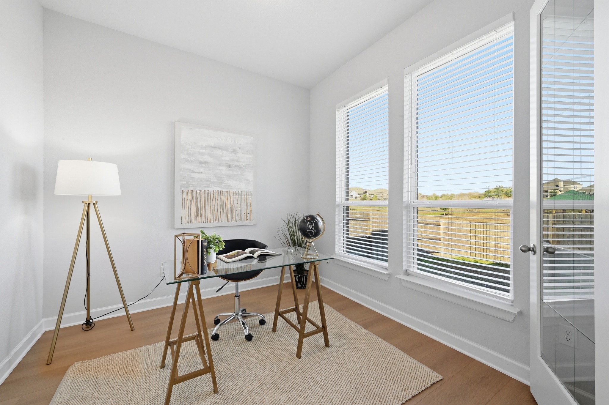 176 Wild Pecan Loop Buda, TX 78610 - Photo 7 of 30 Office area featuring baseboards and light wood finished floors