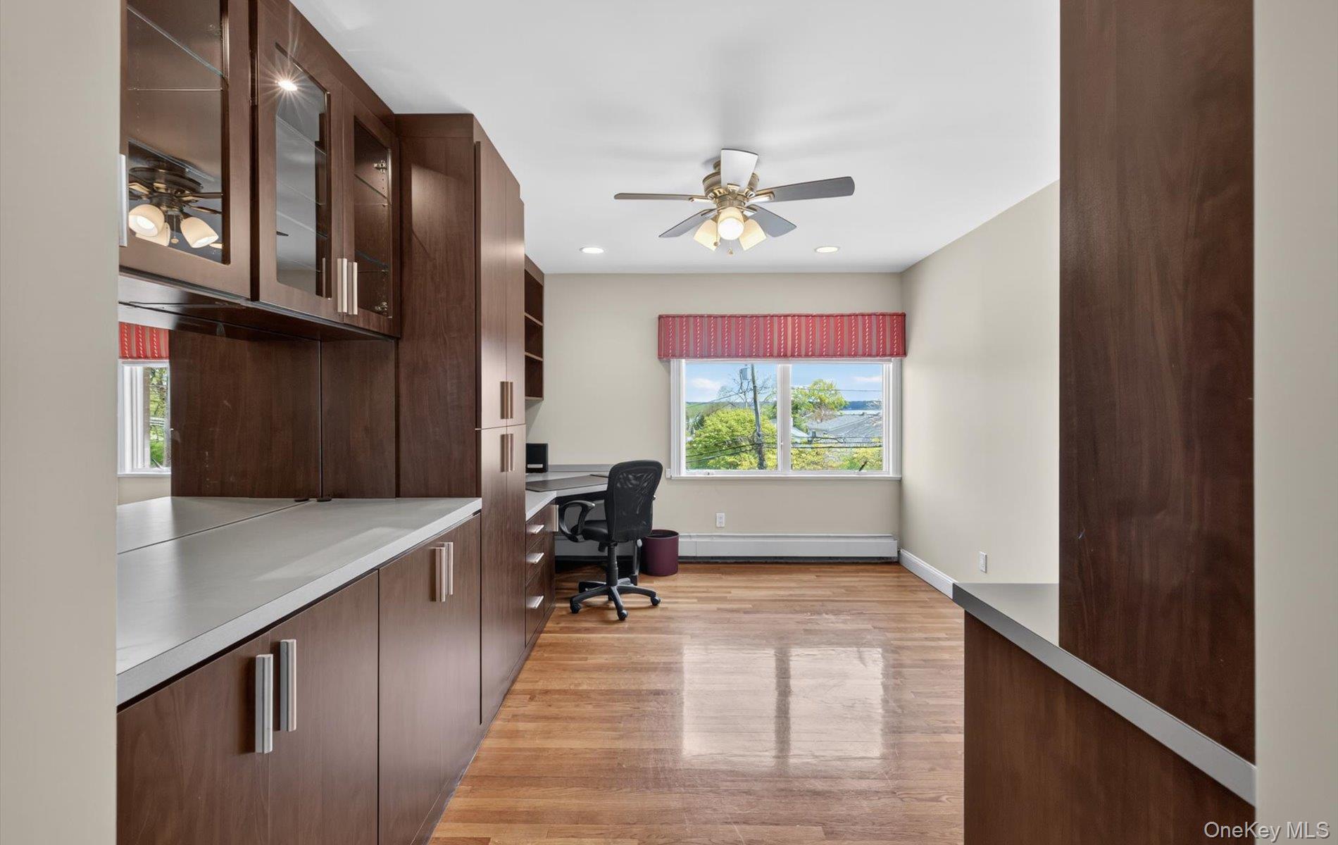 16 East Slope Road Bayville, NY 11709 - Photo 16 of 48 Built-in wood cabinetry with glass-front uppers and ample counter space