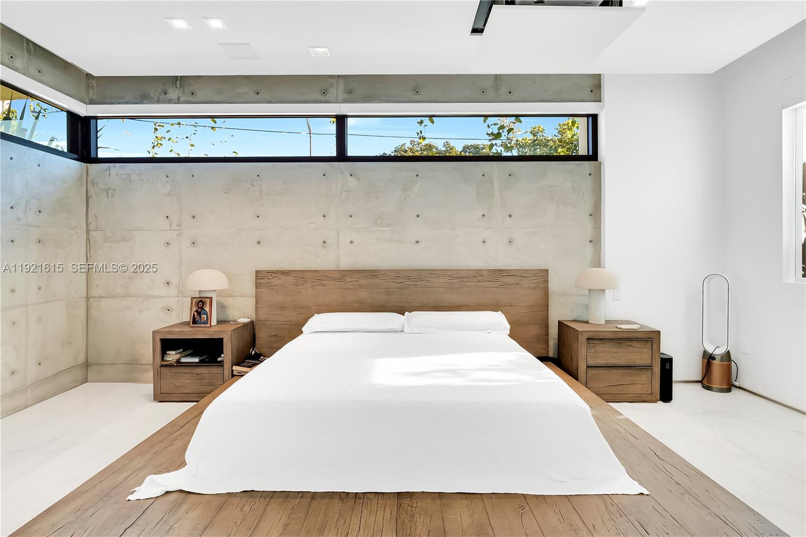 34 Southwest 26th Road Miami, FL 33129 - Photo 35 of 68 a bedroom with a bed and a table