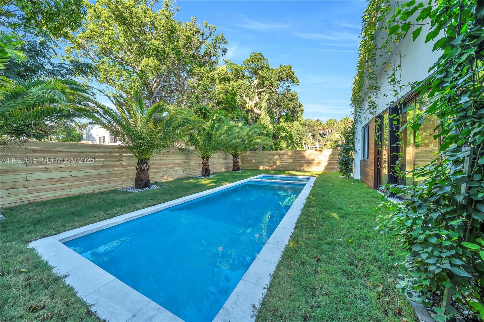 34 Southwest 26th Road Miami, FL 33129 - Photo 58 of 68 a view of a backyard with pool