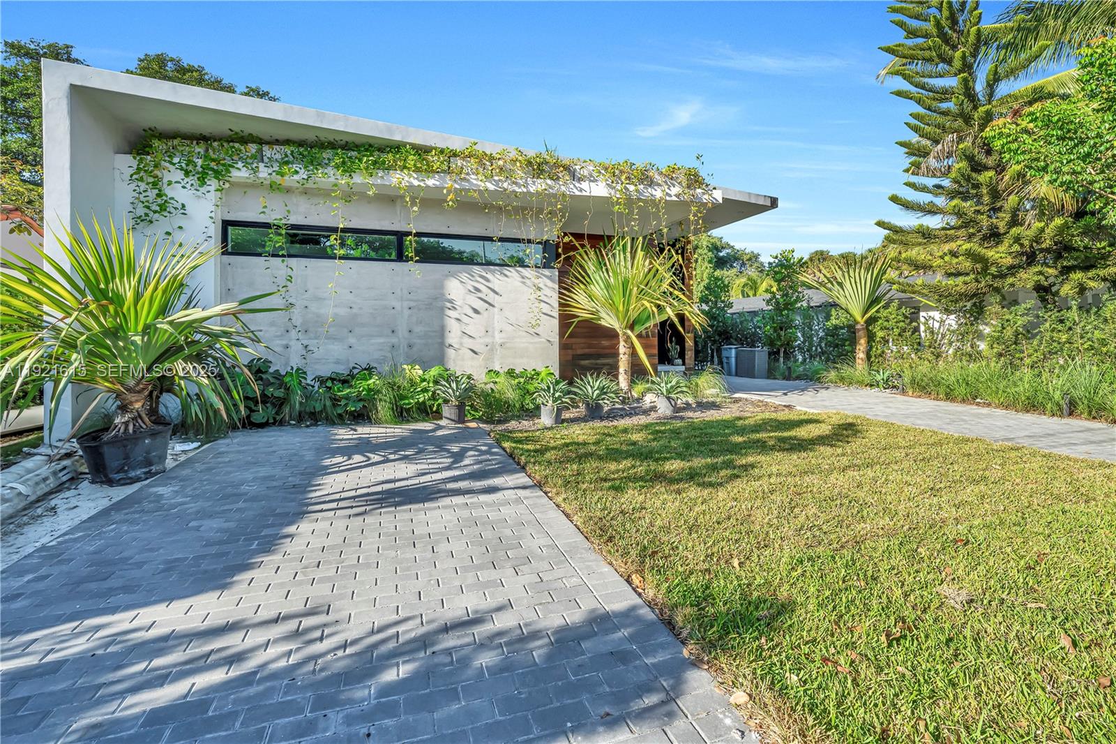 34 Southwest 26th Road Miami, FL 33129 - Photo 9 of 68 a view of a pathway with a yard