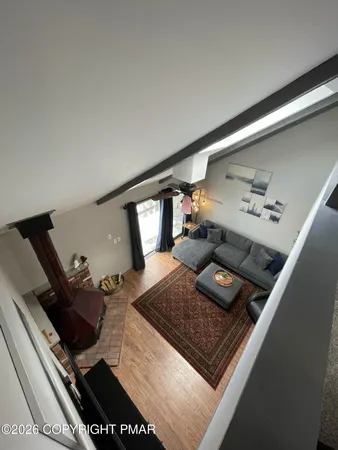 a living room with a rug