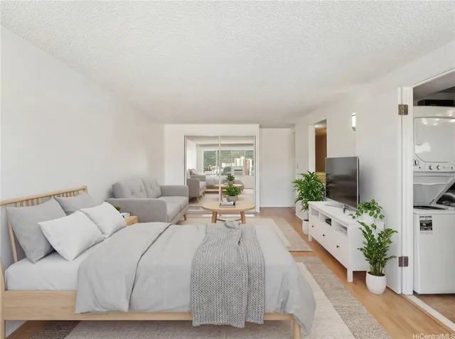 a bed room with a bed window and potted plant