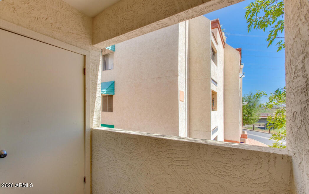 12123 West Bell Road, Unit 219 Surprise, AZ 85378 - Photo 17 of 23 a view of a back yard of the house