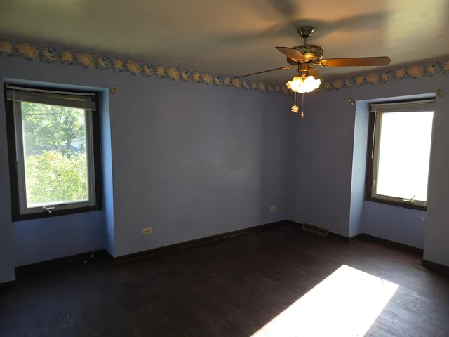 a view of an empty room and window