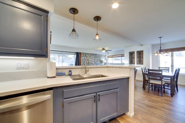 591 Golden Creek Road, Unit 591 Mammoth Lakes, CA 93546 - Photo 11 of 19 a kitchen with a sink and chairs