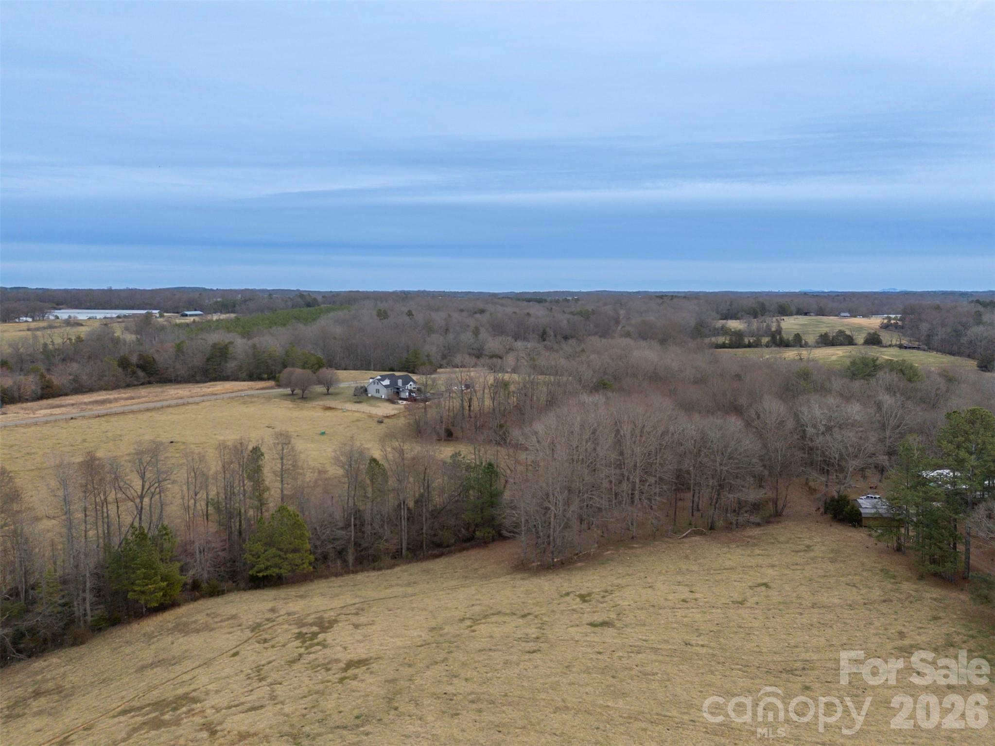 0 Red Barn Road Ellenboro, NC 28040 - Photo 24 of 28 an aerial view of a houses with a lake view