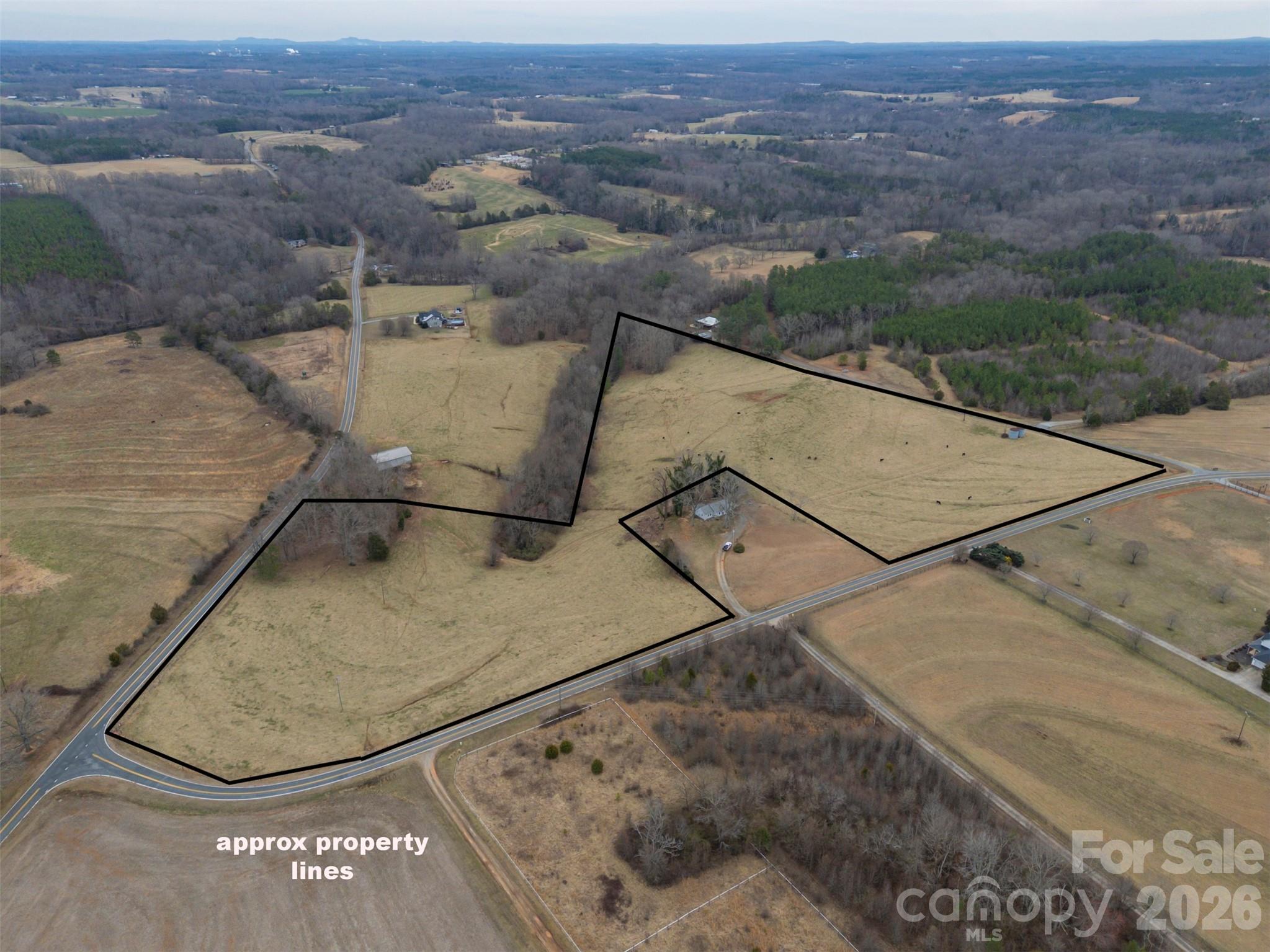 0 Red Barn Road Ellenboro, NC 28040 - Photo 28 of 28 an aerial view of a house with a yard and a large window