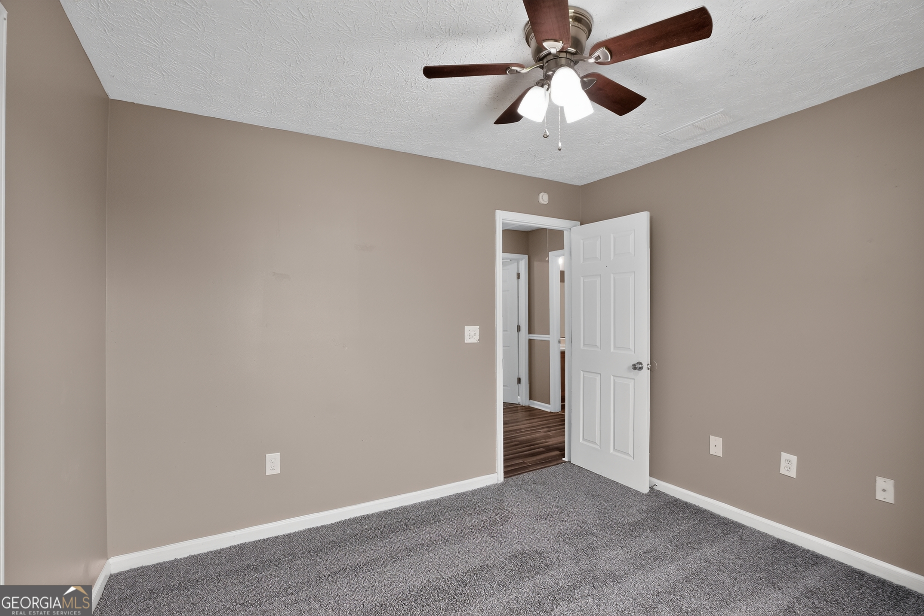 75 Linsley Way Covington, GA 30016 - Photo 30 of 48 wooden floor in an empty room