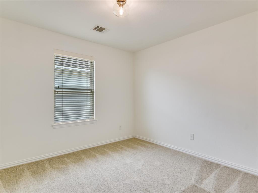736 Bonnet Boulevard Georgetown, TX 78628 - Photo 14 of 27 an empty room with a window