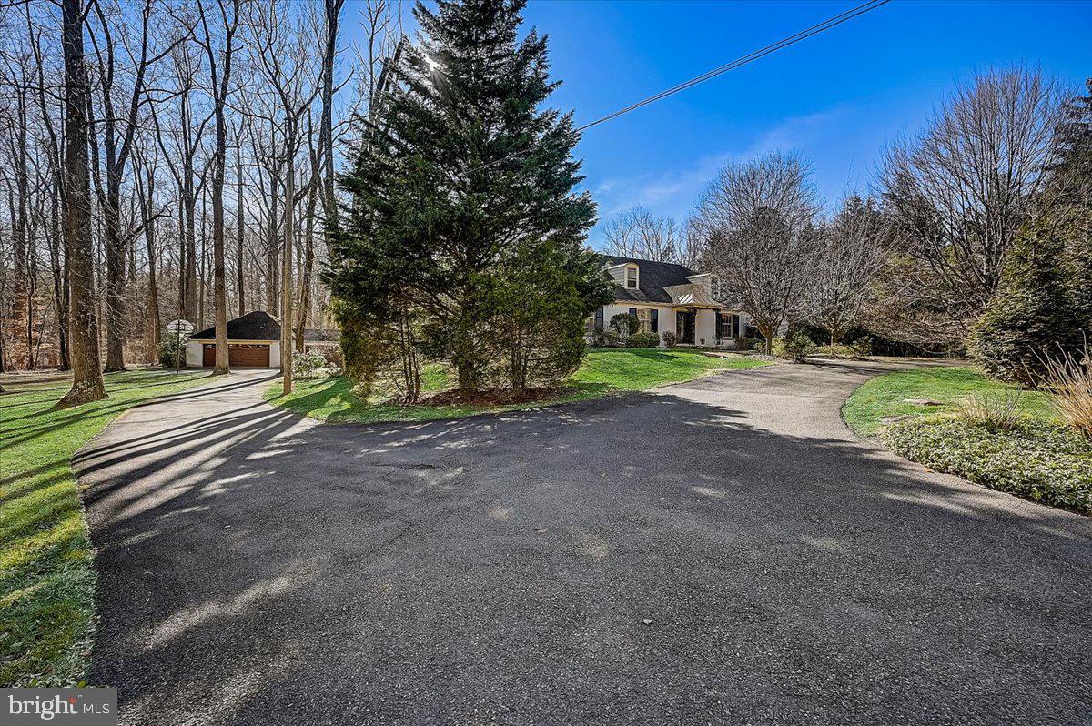 339 Susquehanna Road Ambler, PA 19002 - Photo 4 of 73 Exterior Front w/circular driveway & 6 car Garage