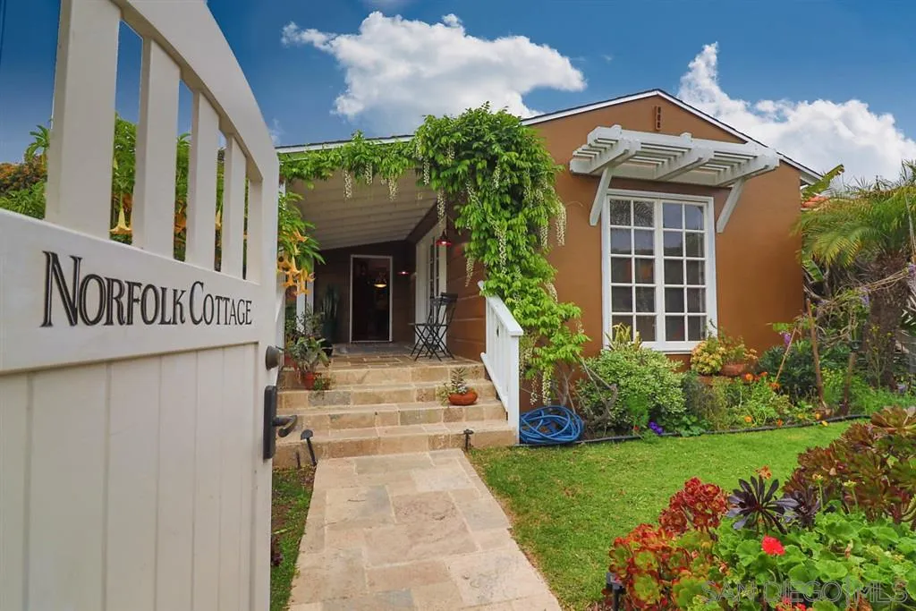 5004 Marlborough Drive San Diego, CA 92116 - Photo 1 of 25 a front view of a house with garden