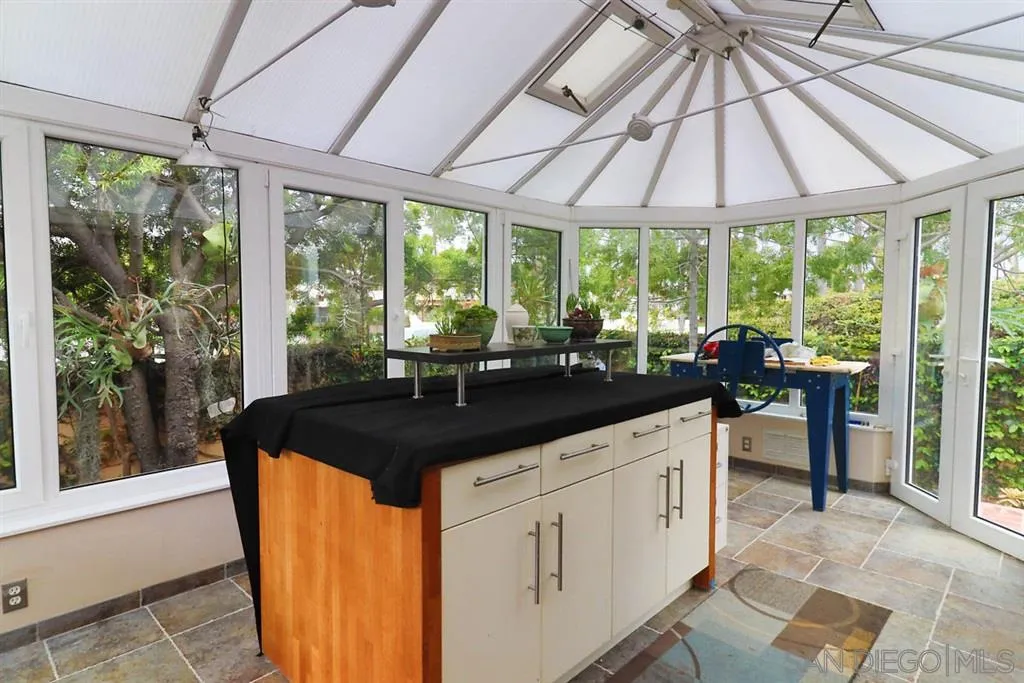 5004 Marlborough Drive San Diego, CA 92116 - Photo 14 of 25 a kitchen with a sink and large window
