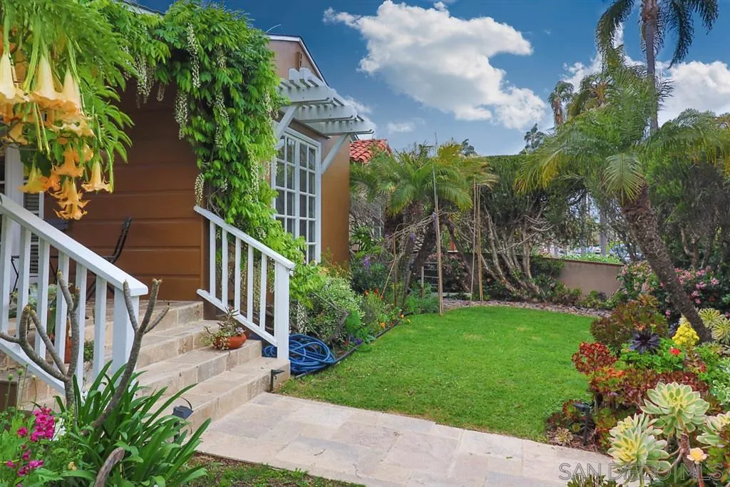 5004 Marlborough Drive San Diego, CA 92116 - Photo 3 of 25 a view of a garden with a flower garden